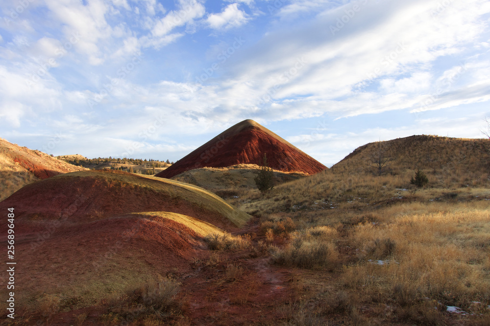 Vibrant colors of Red Hill in the Painted Hills of Oregon on a cold winter day; John Day Fossil Beds National Monument