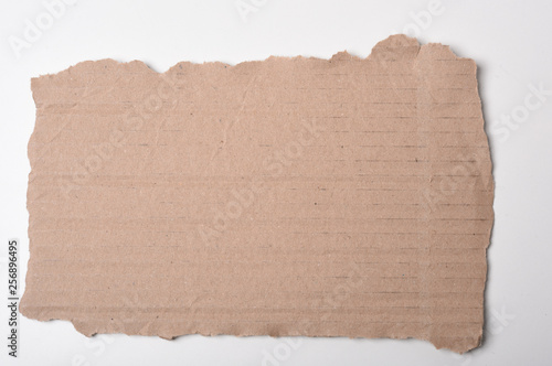 Wallpaper Mural Piece of corrugated cardboard torn, isolated on white background. Cardboard texture ragged edge. Torontodigital.ca