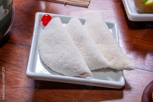 Beiju of tapioca, cassava-based dish typical of the northeastern region of Brazil, now consumed in the whole country photo