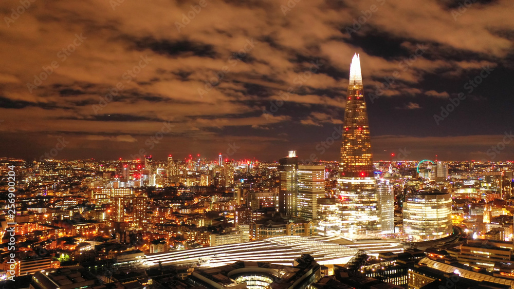 Fototapeta premium Aerial photo from the Shard at night, iconic building in city district, London, United Kingdom