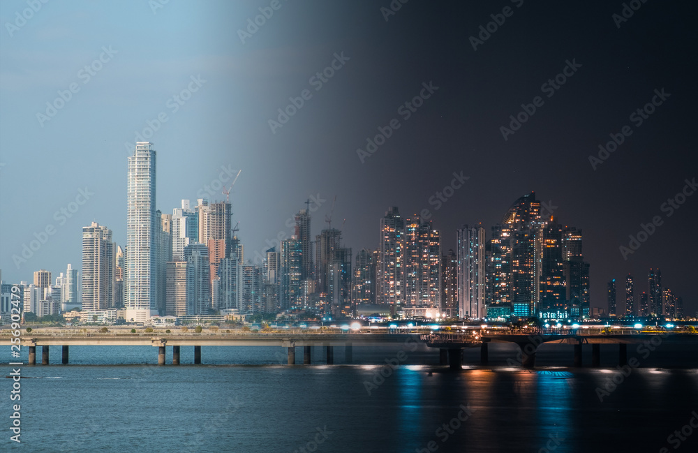 Fototapeta premium Panama City skyline at night and day - cotyscape panorama -