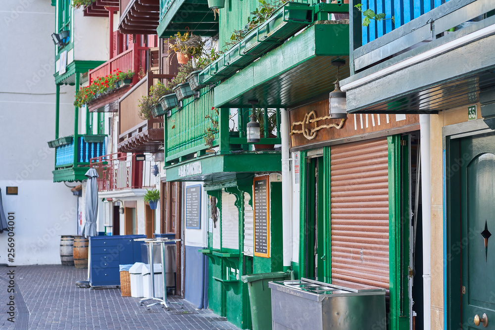 Naklejka premium Typical fishing houses in Hondarribia, a city in Gipuzkoa, Basque Country, Spain, near the French border.
