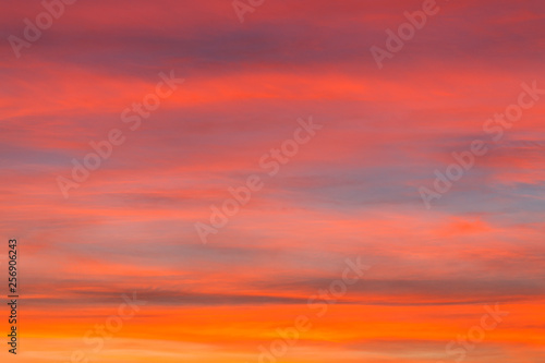 burning sky at sunset. Red sky abstract background. pink cloudy sky. Colorful sunset background  © ihorhvozdetskiy