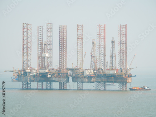 Offshore jack-up drilling rig and gas production platform in Indian waters. 