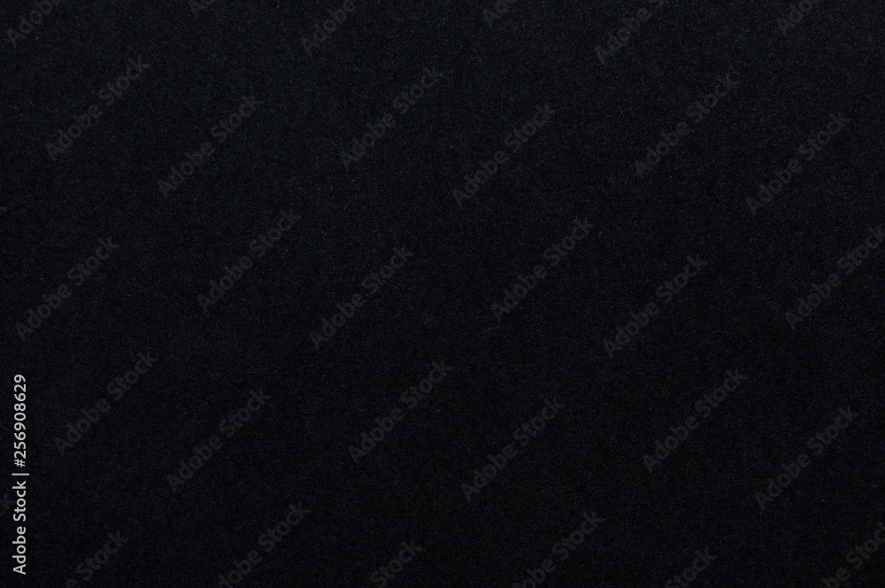 background of empty textured black paper background of empty textured black paper