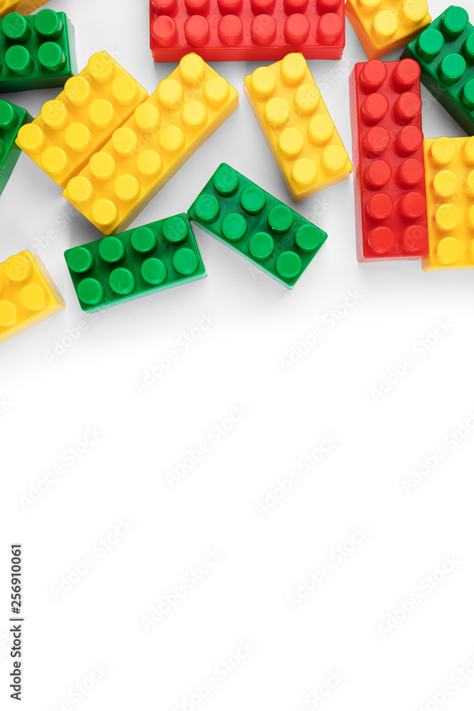 Obraz premium Plastic building blocks isolated on white background