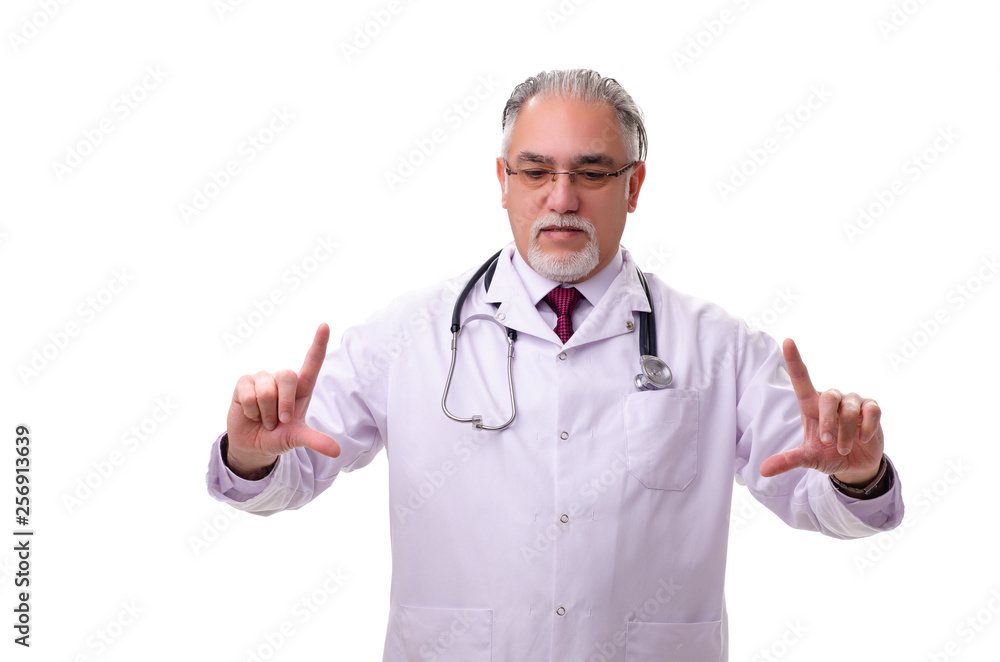 Old male doctor isolated on white Old male doctor isolated on white