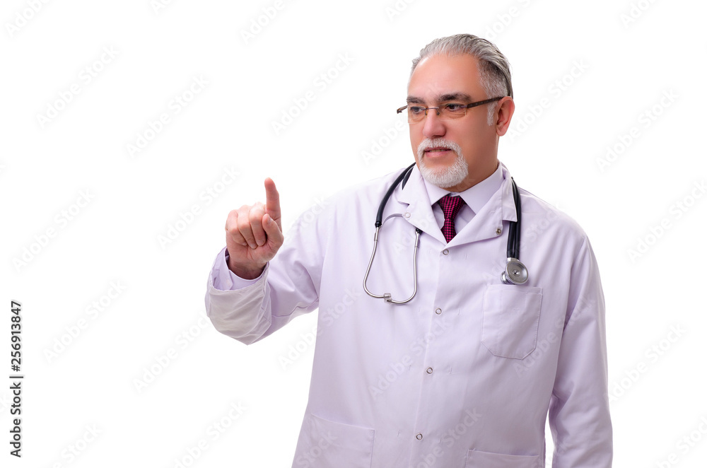 Old male doctor isolated on white Old male doctor isolated on white
