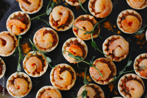 luxury tartlets with shrimp for dinner in the restaurant, catering