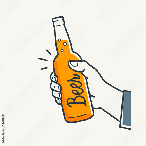 Hand hold beer bottle. Male hand holding a beer