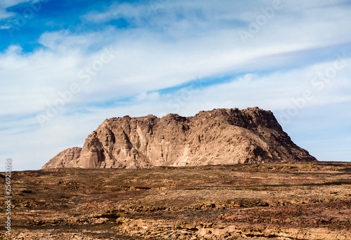 high mountain in the desert against the blue sky and white clouds in Egypt Dahab South Sinai