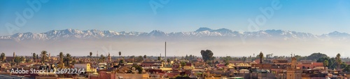 Panorama of Marrakech city skyline with Atlas mountains in the background