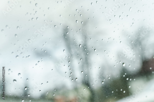 blurry background with raindrops © Valeriysurujiu