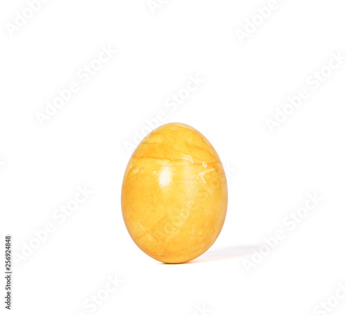 Orange easter egg isolated on white background
