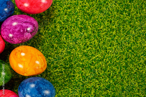 Easter eggs as decorative background for greeting cards and place for your own text