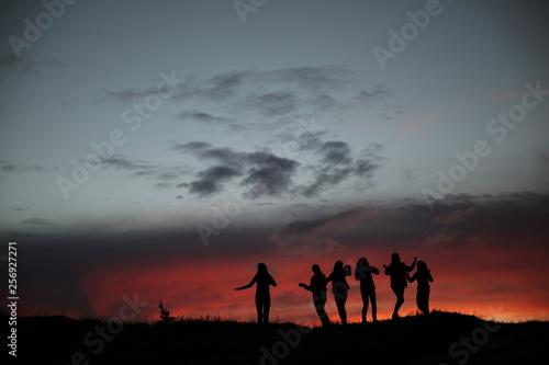 happy people playing game at sunset.turkey  © murat