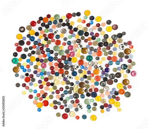 background - multicolored buttons on a white surface