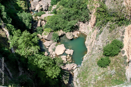 deep gorge with lake in Ronda. Spain