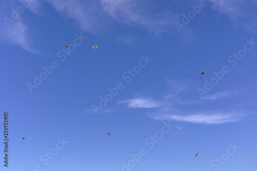 Kite flying, deep blue sky with some clouds. Clean Monday holiday. Athens, Greece 2019.