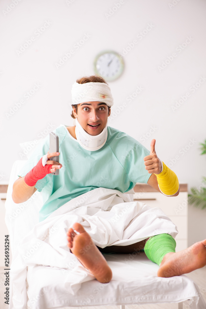 Young injured man staying in the hospital Young injured man staying in the hospital