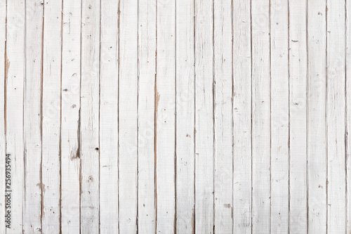 A grungy white painted wooden background