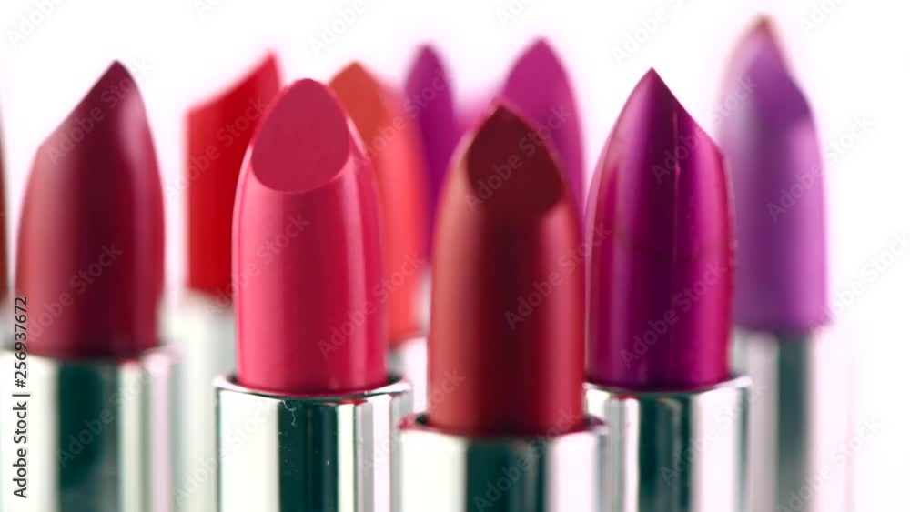 Lipstick tints palette. Fashion colorful lipsticks rotated over white background. Professional makeup and beauty. Lipgloss closeup. 4K UHD video footage. 3840X2160 Lipstick tints palette. Fashion colorful lipsticks rotated over white background. Professional makeup and beauty. Lipgloss closeup. 4K UHD video footage. 3840X2160