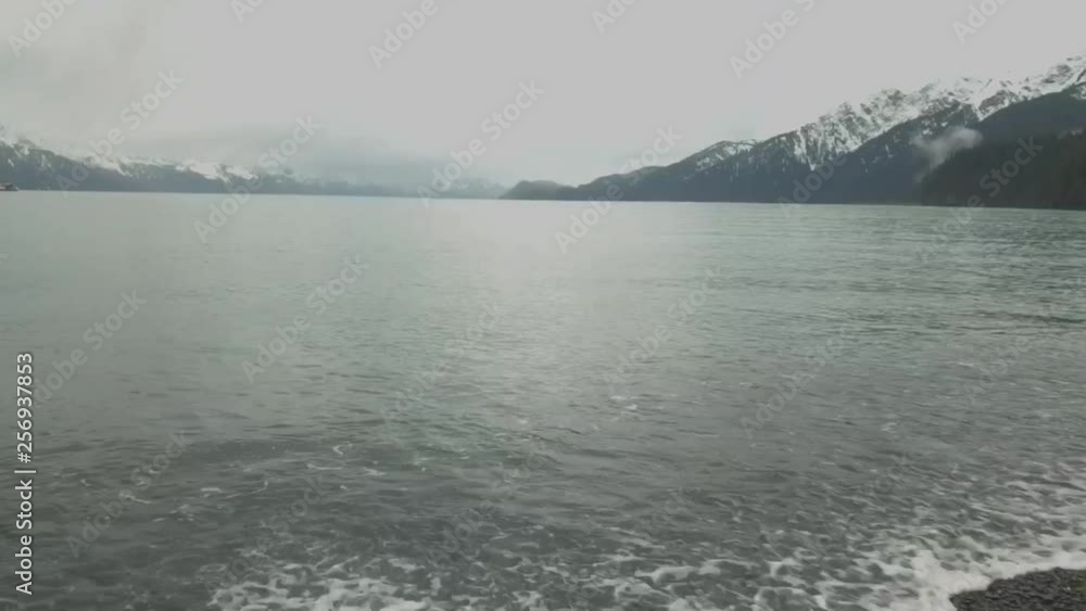 Tugboats and barges anchored up on Resurrection bay in Alaska Tugboats and barges anchored up on Resurrection bay in Alaska