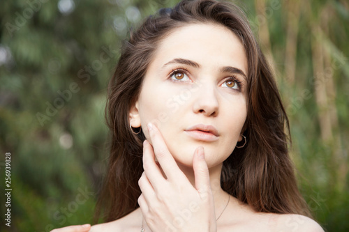 Beautiful young woman portrait in outdoors