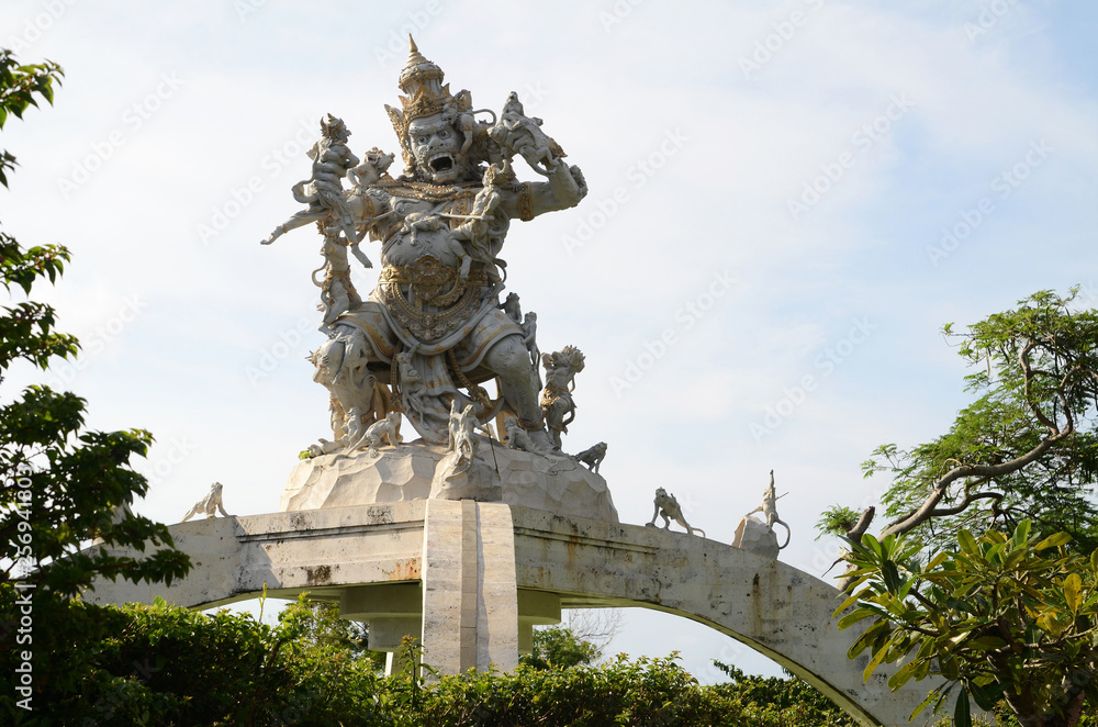 Statue of God fighting with monkeys in Pura Luhur Uluwatu