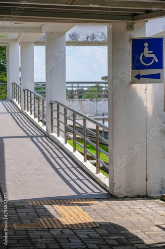 Shadow on the path of the disabled