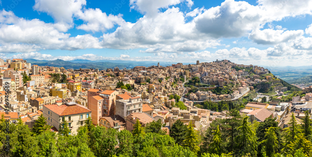 Panoramic aerial view of Enna old town, Sicily, Italy. Enna is a city and comune located at the center of Sicily. At 931 m above sea level, Enna is the highest Italian provincial capital Panoramic aerial view of Enna old town, Sicily, Italy. Enna is a city and comune located at the center of Sicily. At 931 m above sea level, Enna is the highest Italian provincial capital