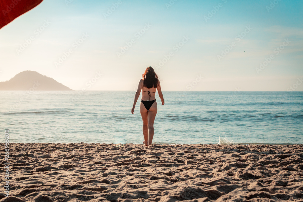 Woman by the beach