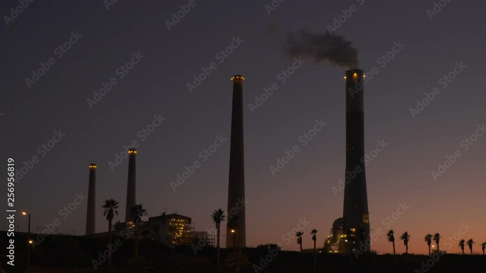 Power station Tube With Smoke At summer Night. pollution in Israel Power station Tube With Smoke At summer Night. pollution in Israel