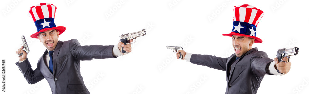 Man with american hat and handguns Man with american hat and handguns