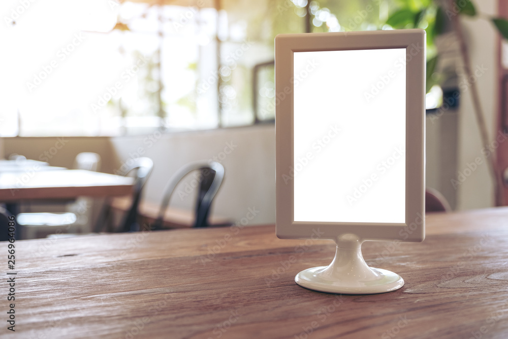 A blank menu sign on wooden table in cafe A blank menu sign on wooden table in cafe