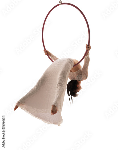 Fototapeta Naklejka Na Ścianę i Meble -  Woman in white dress hanging on a ring