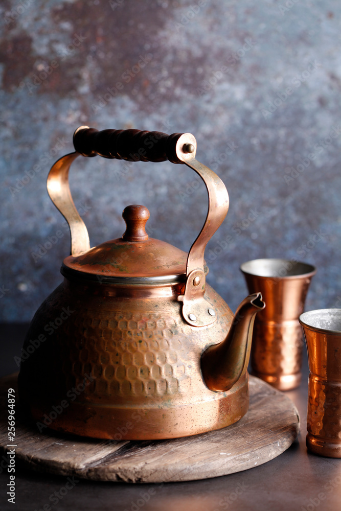 ancient moroccan tea pot on wooden tray ancient moroccan tea pot on wooden tray