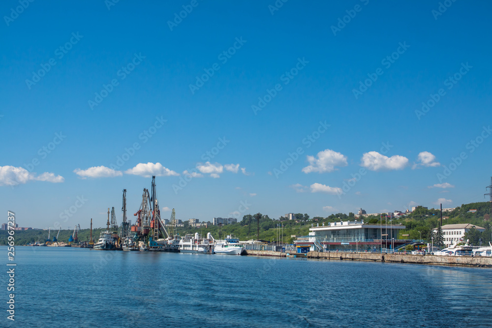 Ships and cranes in the river port of Ulyanovsk.