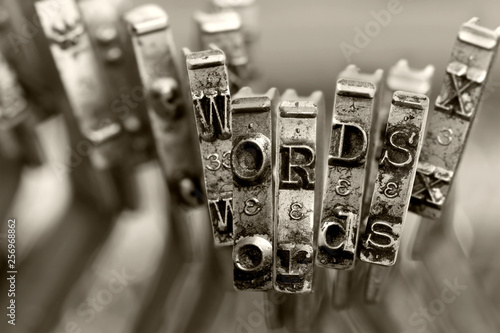 the words WORDS with old typewriter keys  macro photo