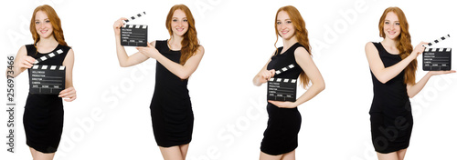 Tela Young woman in black dress holding clapper-board