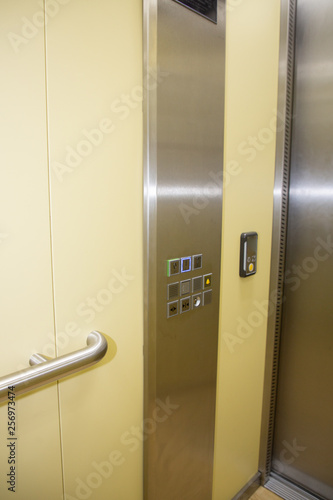 Wallpaper Mural Modern buttons Elevator Interior and Exterior alloy yellow silver Torontodigital.ca