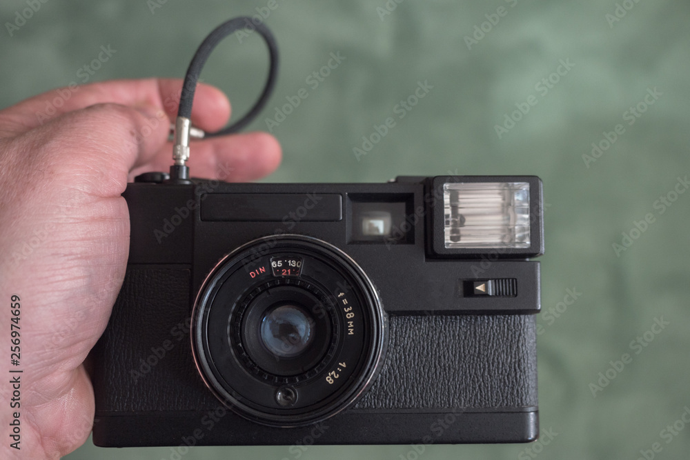 Black Film Camera with control cable. Camera shutter control. Selfies