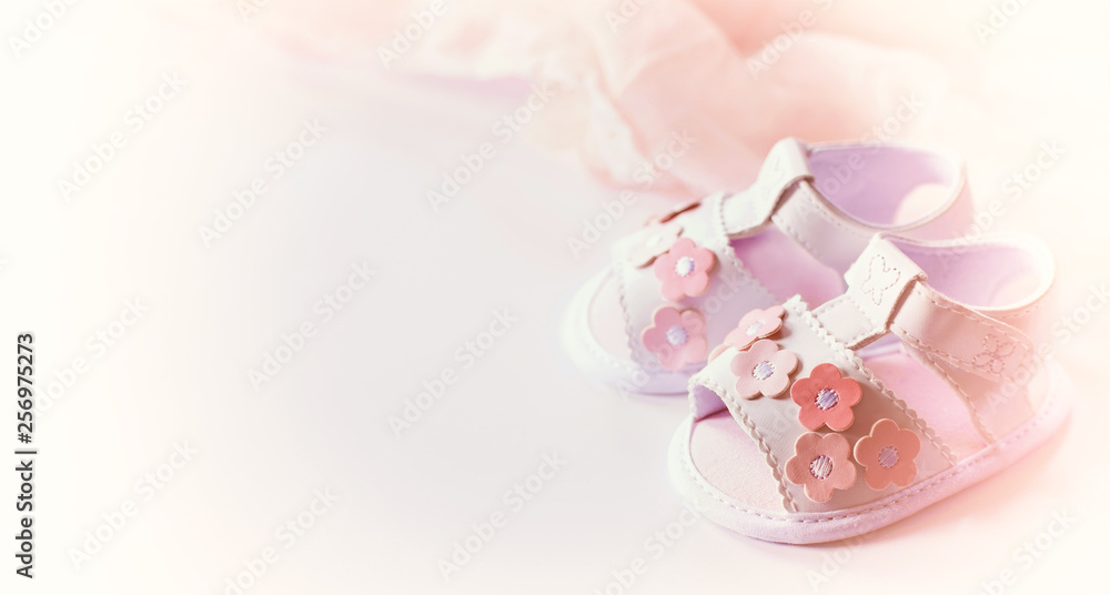 Fototapeta premium children's small shoes close-up. background with white sandals.