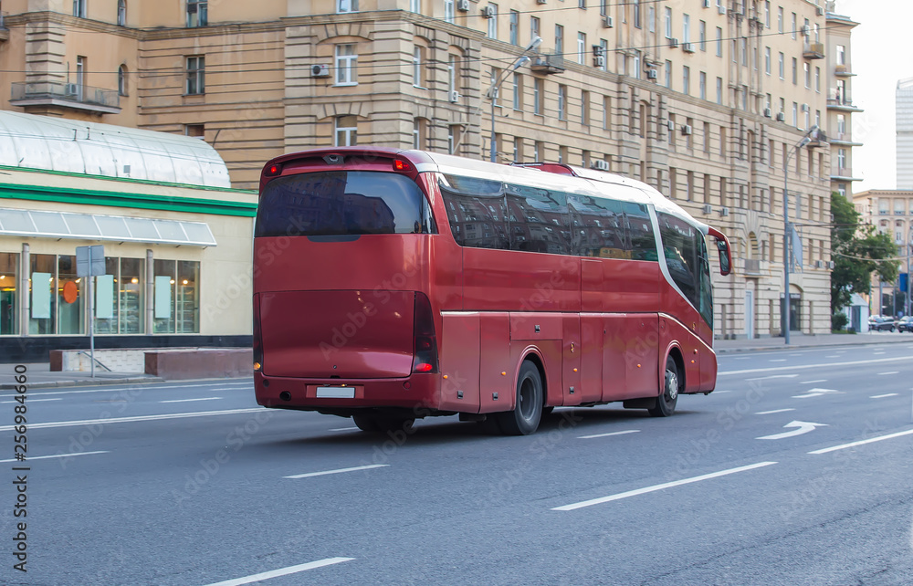 tourist bus goes on street