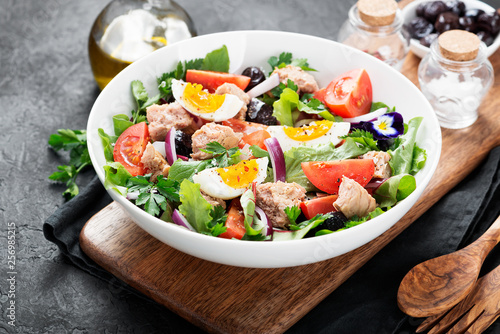Tuna Fish Salad with Lettuce  Cherry Tomatoes  egg and olives.