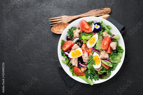 Tuna Fish Salad with Lettuce, Cherry Tomatoes, egg and olives.