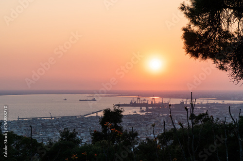 Thessaloniki / Greece 22 march 2019 : sunset in the most beautiful city of Greece photo taken from the hilltop forest Kedrinos Lofos, also known as Seich Sou,the temperture is fine for a walk