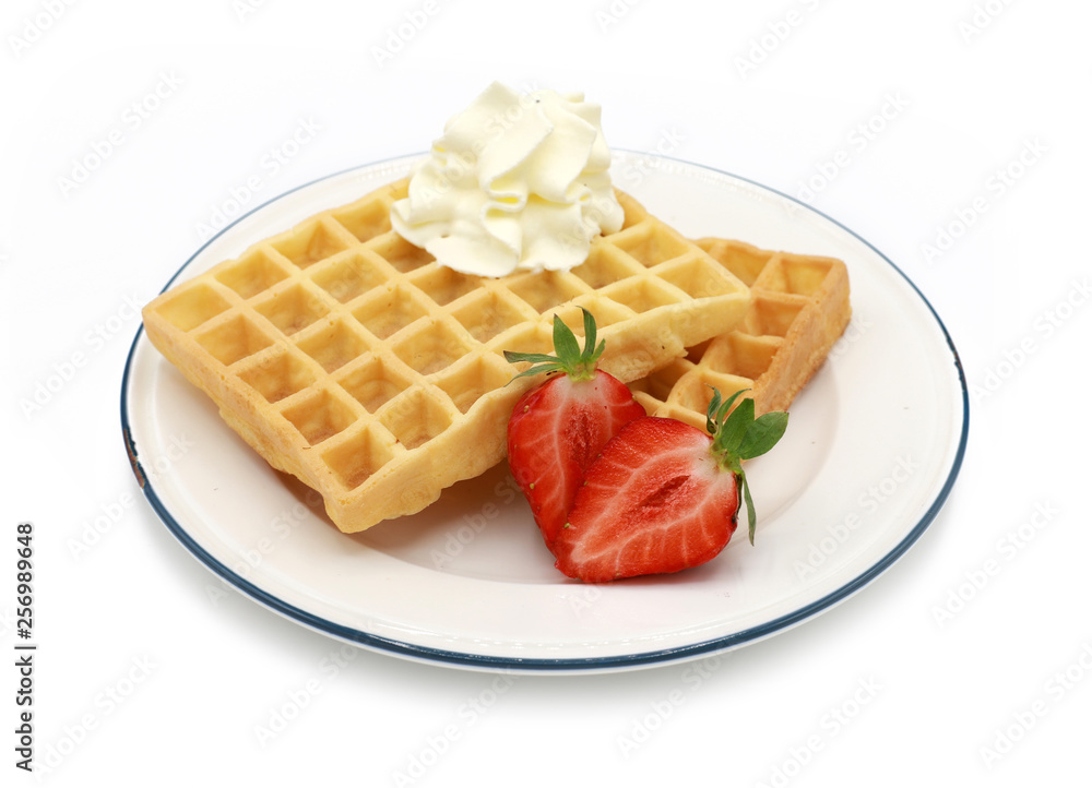 fresh belgian waffles with strawberries and whipped cream on a plate isolated on white background fresh belgian waffles with strawberries and whipped cream on a plate isolated on white background