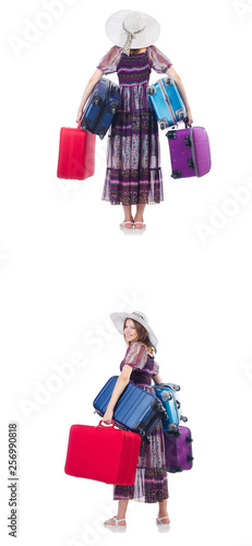 Young woman with suitcases isolated on white