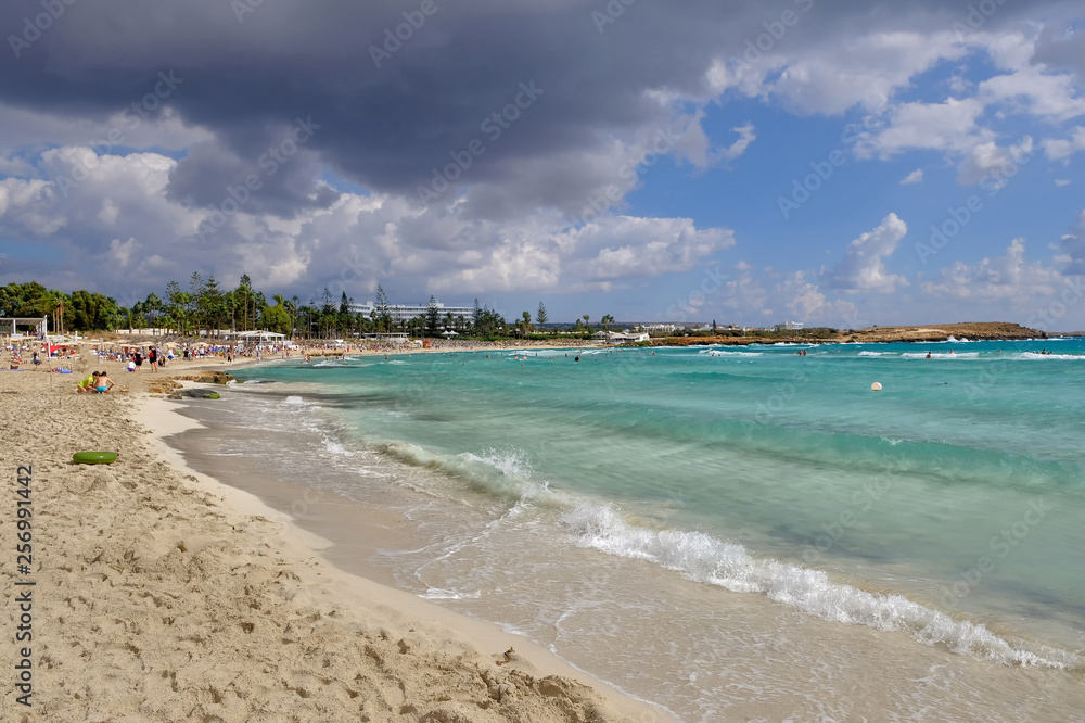 Beautiful Ayia Napa Nissi beach during cloudy weather. Landscape taken on Cyprus island. Beautiful Ayia Napa Nissi beach during cloudy weather. Landscape taken on Cyprus island.